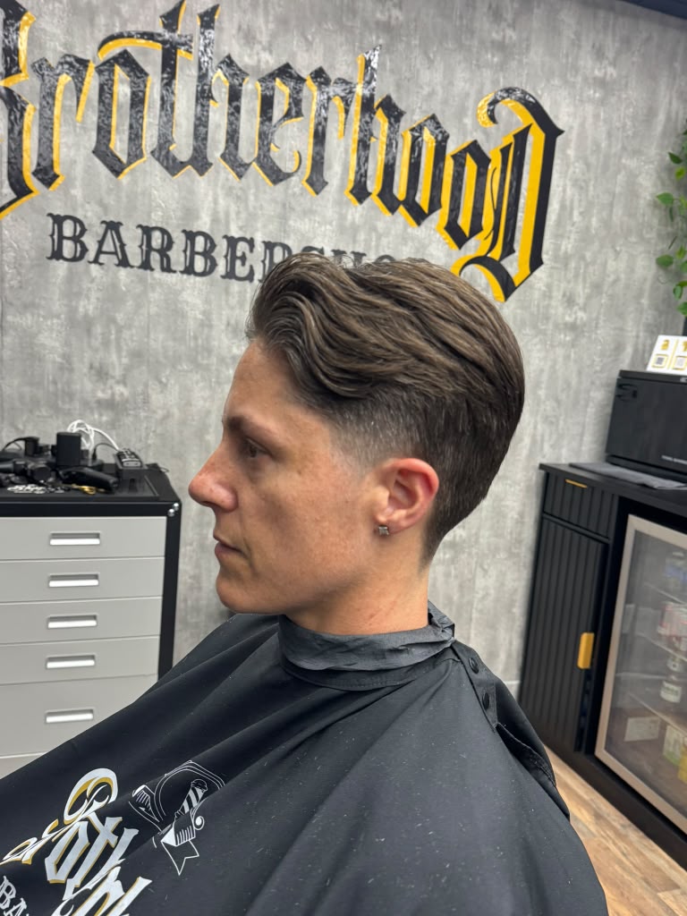 Classic side part haircut result at Brotherhood Barbershop in Deerfield Beach, FL